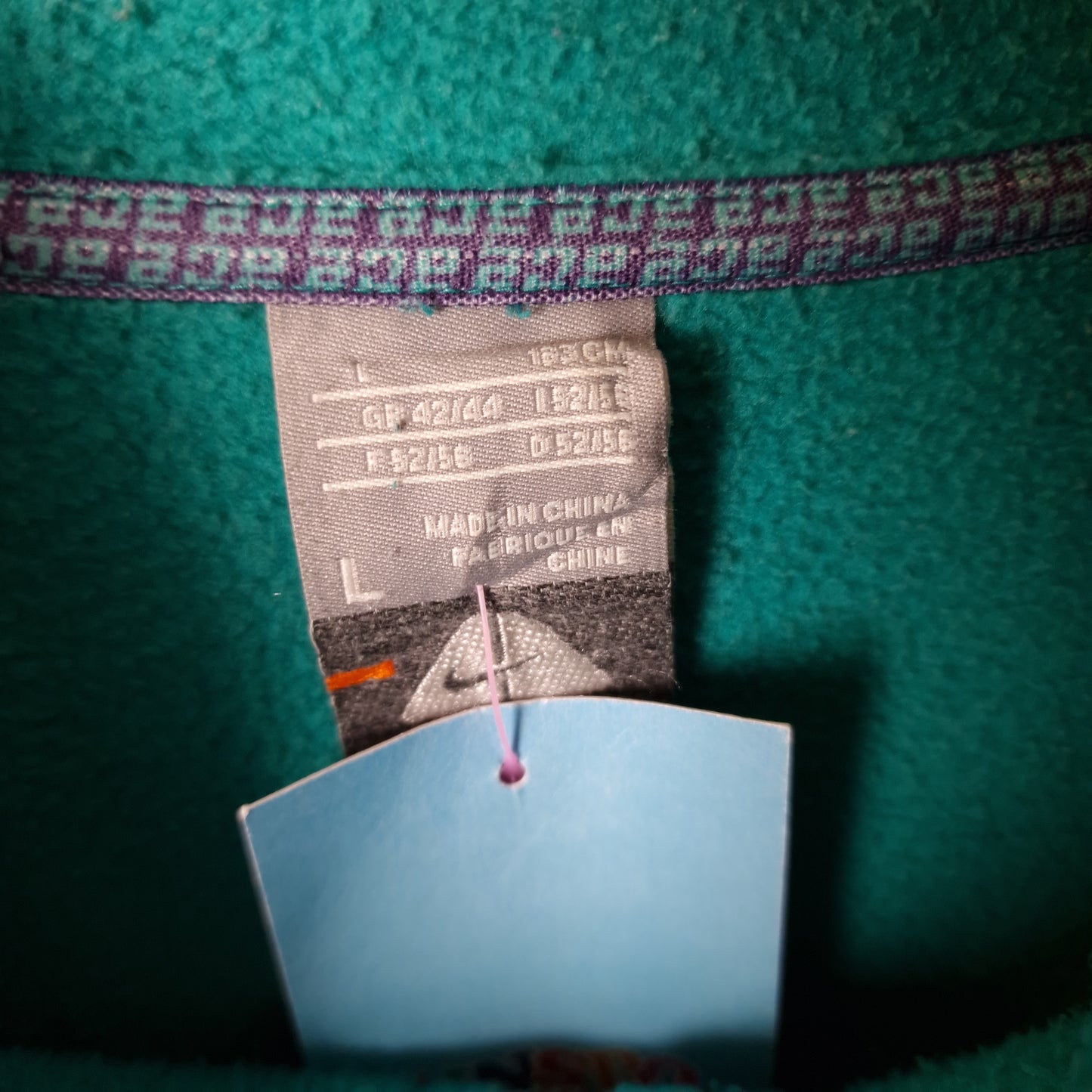 Vintage Nike ACG patterned hoodie in turquoise blue - large