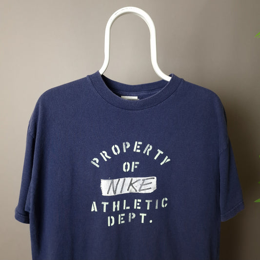 Vintage Nike t-shirt in blue - medium