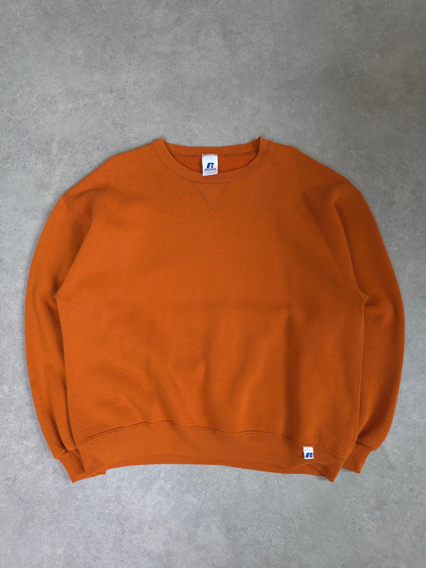 vintage russell athletic blank sweatshirt in orange - large
