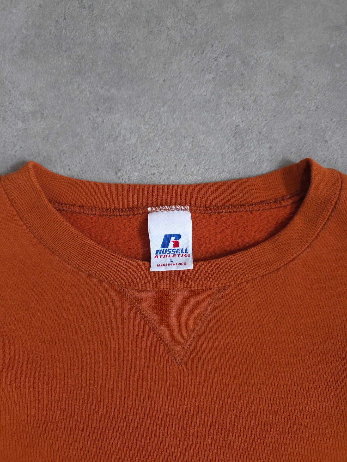 vintage russell athletic blank sweatshirt in orange - large